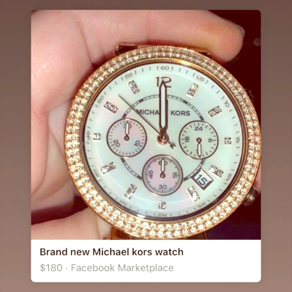 Michael kors watch diamonds around it
